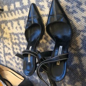 Manolo Blahnik black strappy heels with white stitching